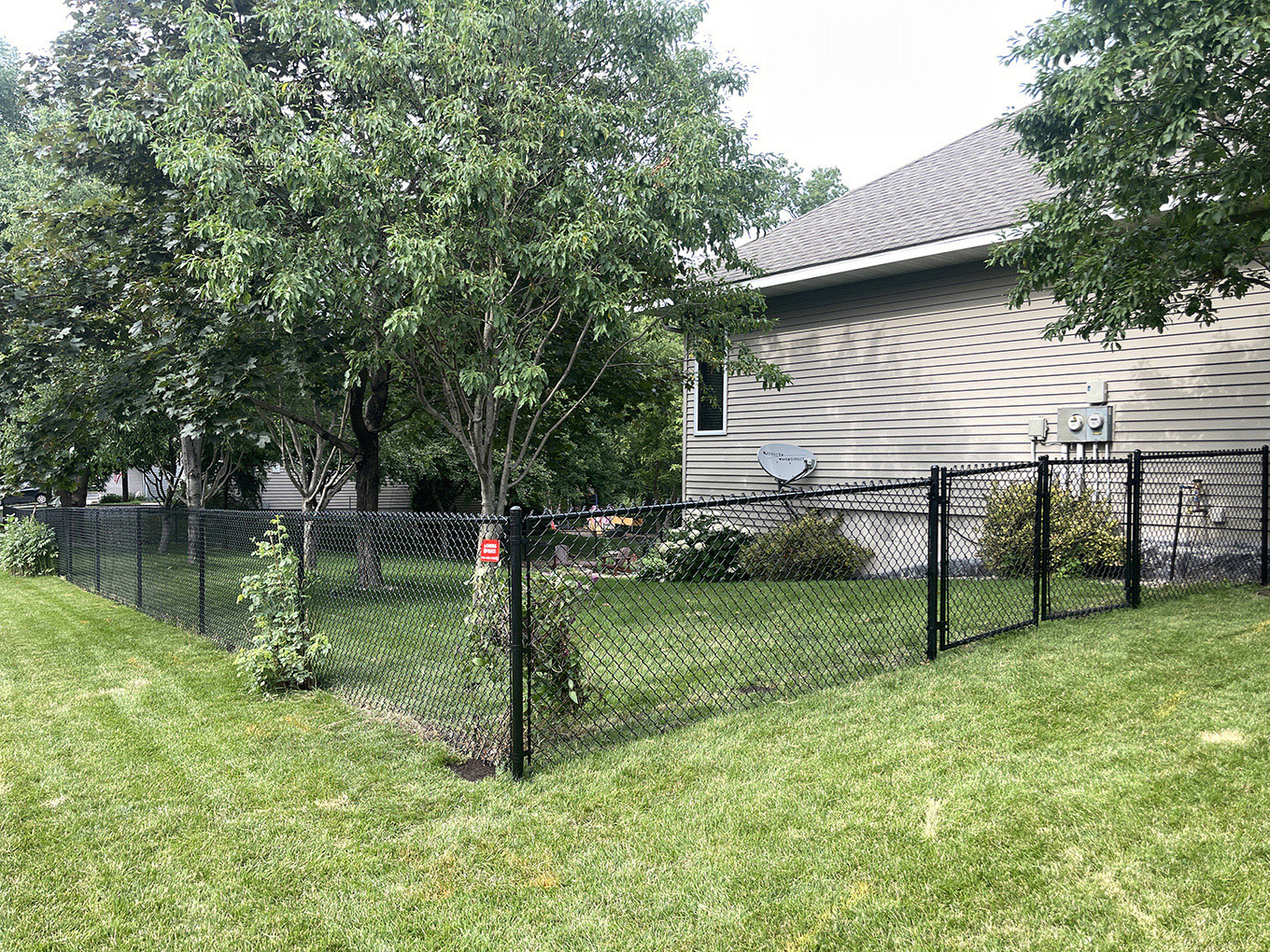Photo of a residential chain link fence from a fencing contractor in Minnesota